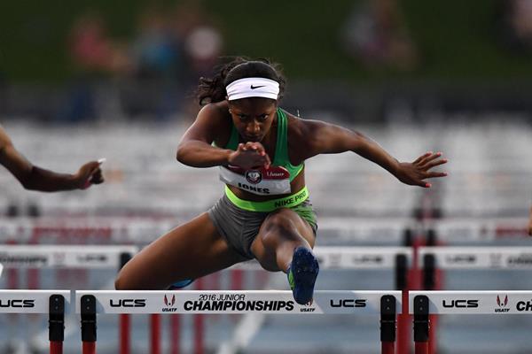 Tia Jones on her way to equalling the world U20 100m hurdles record in Clovis (Kirby Lee)