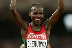 Vivian Cheruiyot after winning the 10,000m at the IAAF World Championships, Beijing 2015 (Getty Images)