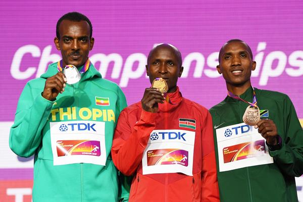 Ethiopia's Tamirat Tola, Kenya's Geoffrey Kirui and Tanzania's Alphonce Felix Simbu pose with their medals after the men's marathon at the IAAF World Championships London 2017 (Getty)