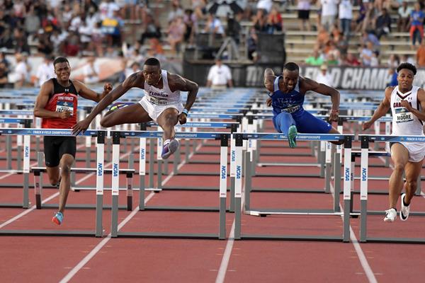 Grant Holloway edges Daniel Roberts 12.98 to 13.00 to take the NCAA title (Kirby Lee)