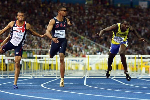 (L-R) Great Britain's William Sharman, the USA's Terrence Trammell and Ryan Brathwaite from Barbados cross the line of the men's 110m hurdles final at the 12th IAAF World Championships in Athletics (Getty Images)