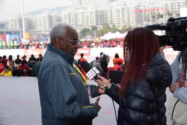 IAAF President Diack being interviewed by Chinese TV at the 2014 Xiamen International Marathon (IAAF)