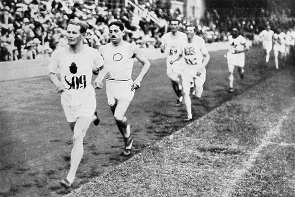 Hannes Kolehmainen leads the 1912 Olympic 5000m final from Jean Bouin and George Hutson (IOC)