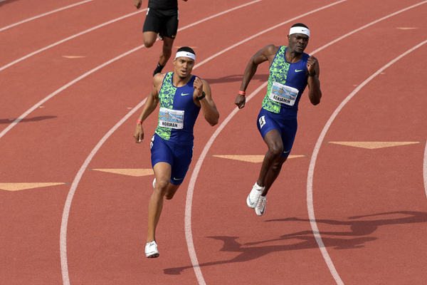 Michael Norman leads from Rai Benjamin in the 400m at the Mt SAC Relays (Kirby Lee)