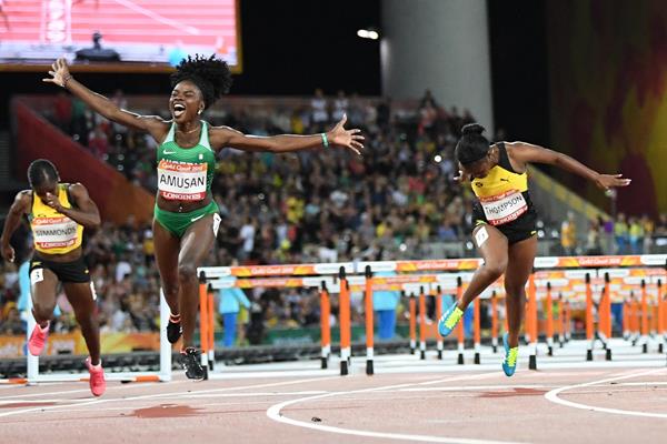 Tobi Amusan taking the 2018 Commonwealth title (AFP/Getty Images)