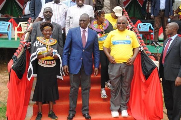 Tegla Loroupe with Kenyan deputy president William Ruto and chairman of National Cohesion and Integration Commission Francis Ole Kaparo (TLPF)