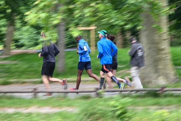Runners jogging in the Bois de Boulogne park, after the mayor of Lille announced the reopening of some parks and gardens in the northern French city (AFP/Getty Images)