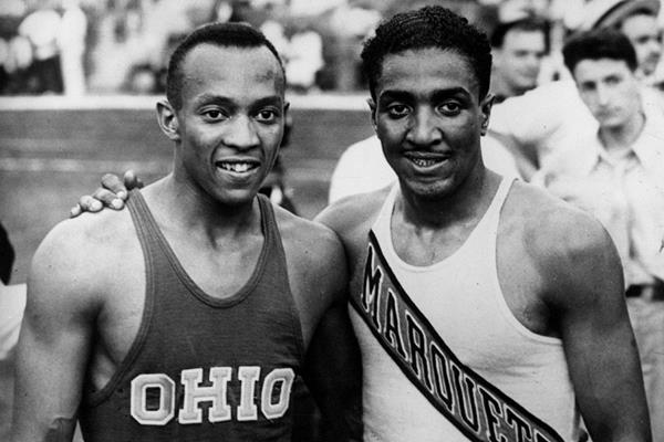 Jesse Owens and Ralph Metcalfe (Getty Images)