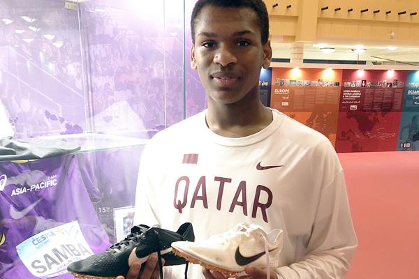 Mubarak Al-Sulaiti with Kevin Mayer's spikes (IAAF Heritage)