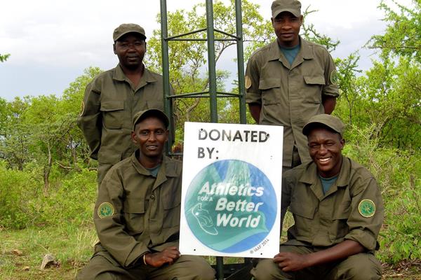 Rangers with an ABW logo after constructing a radio repeater station in Tanzania (Big Life Foundation)