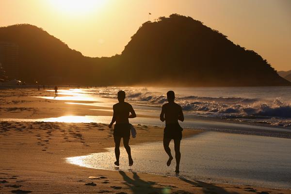 Runners on Copacabana Beach (Getty Images)