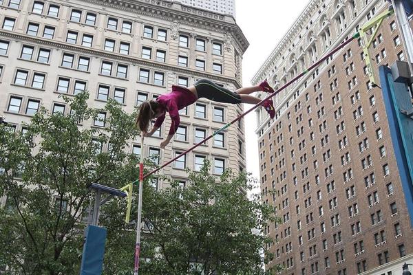 Ekaterini Stefanidi vaulting in Herald Square, New York, ahead of the IAAF / Nestlé Kids’ Athletics event on 11 June, 2014 (Victah Sailer / IAAF)