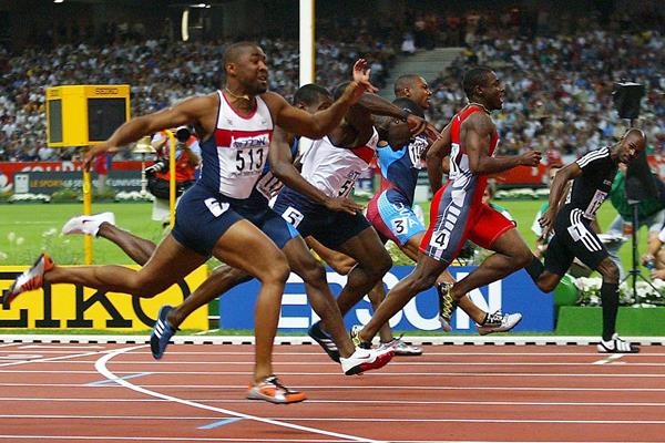 Kim Collins (far right) wins the 100m at the 2003 IAAF World Championships in Paris (Getty Images)