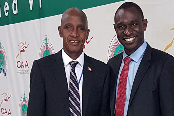 Dieudonne Kwizera, president of the Burundi Athletics Federation, with 800m world record-holder David Rudisha ()