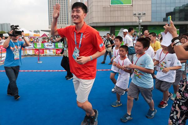 Sprint hurdler Liu Xiang at the IAAF Kids' Athletics event in Nanjing (Getty Images)