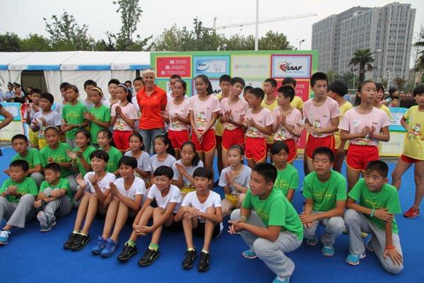 Kajsa Bergqvist at Kids' Athletics event in Nanjing (IAAF)