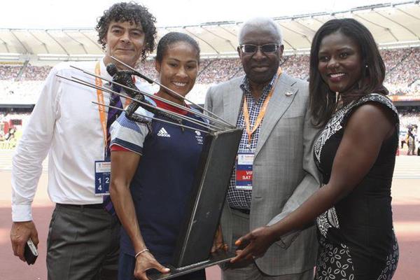 Shaun Campbell, Rachel Yankey, Lamine Diack and Dentaa Amoateng pose with Arthur Wharton Trophy at London's Olympic stadium, Saturday 27 July 2013 (Arthur Wharton Foundation)