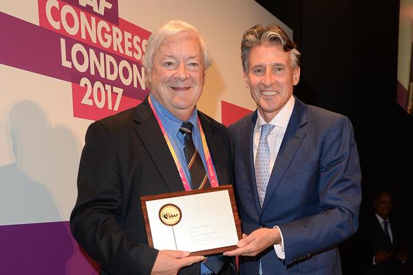Fletcher McEwen of Australia receiving his IAAF Plaque of Merit from IAAF President Sebastian Coe in London (Getty Images)