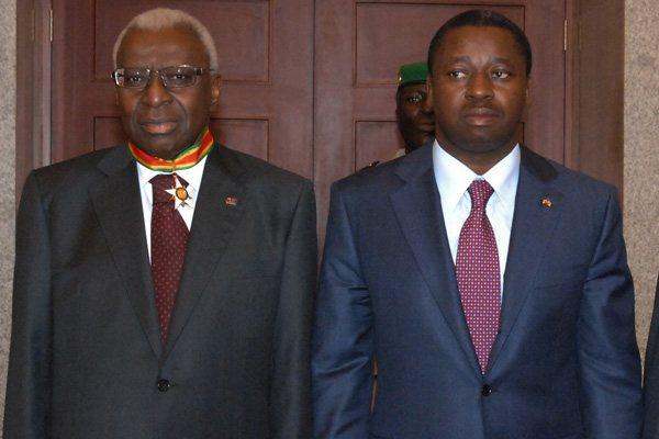 (l to r) President Lamine Diack - wearing Commander of the Order of Mono - and Togo President Faure Essozimna Gnassingbe (IAAF)
