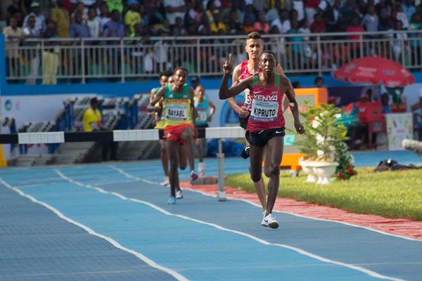 Conseslus Kipruto on the way to his first African steeplechase title in Asaba (Bob Ramsak)
