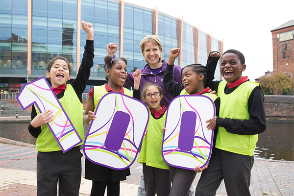 Katharine Merry with local school children to mark 100 days to go until the IAAF World Indoor Championships Birmingham 2018 (LOC)