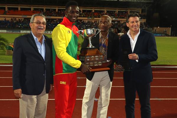 NACAC President Victor Lopes, Carifta Games founder Austin Sealy and IAAF President Sebastian Coe after Grenada's Anderson Peters was presented with the Austin Sealy award to the 45th Carifta Games' Most Outstanding Athlete Award (Organisers)