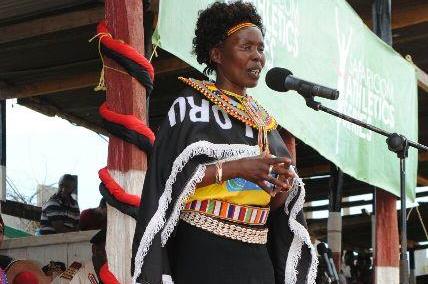 Tegla Loroupe speaks to the crowds at the Tegla Loroupe Peace Race (TLPF)
