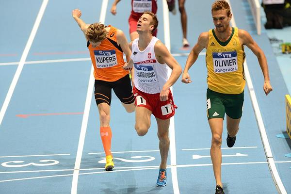 Marcin Lewandowski (centre) in the 800m at the IAAF World Indoor Championships Sopot 2014 (AFP / Getty Images)