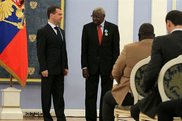 President Dmitry Medvedev with IAAF President Lamine Diack, wearing Russian Order of Friendship, in Moscow, 22 Nov 2011 (ARAF)