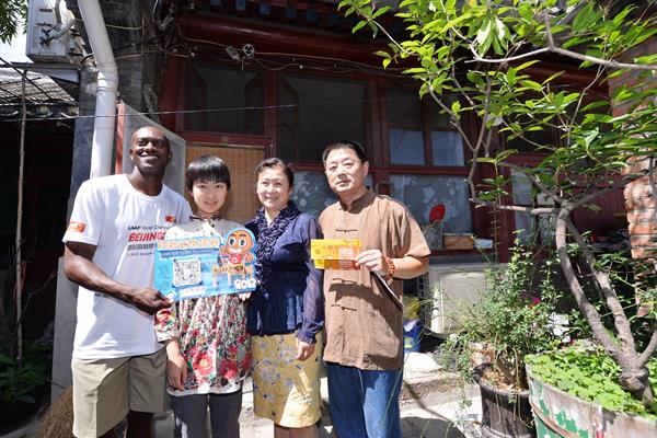 Allen Johnson delivering IAAF World Championships, Beijing 2015 tickets (IAAF World Championships, Beijing 2015 LOC)