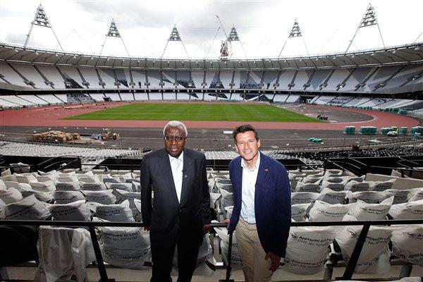 IAAF President Lamine Diack and LOCOG chairman Lord Sebastian Coe pose for photographs during a visit to the London 2012 Olympic stadium site in Stratford, on August 5, 2011 in London, England (Getty Images)