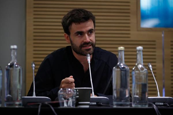 Mitchell Krier addressing the IAAF World Coaches Conference in London (Getty Images)