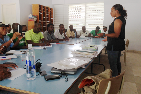 Educating the coaches at the athletics camp in Haiti (NFP Foundation)