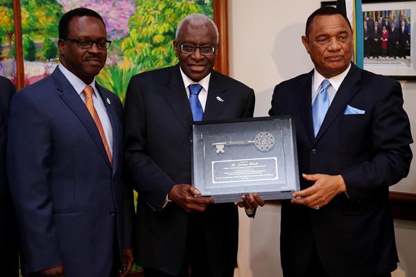 IAAF President Lamine Diack is honoured by Prime Minister of the Bahamas Perry Christie (Getty Images)
