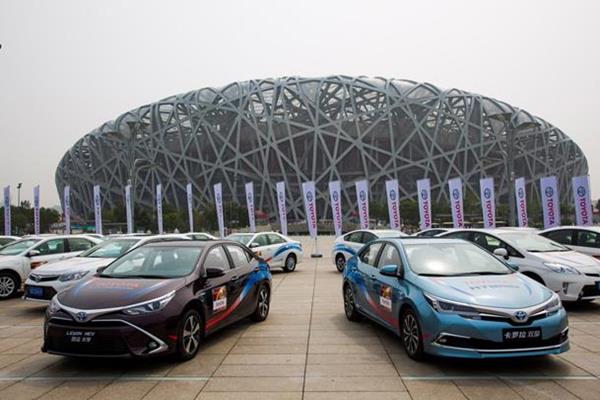 The fleet of Toyota cars outside the Birds' Nest Stadium (Toyota / Beijing 2015 LOC)