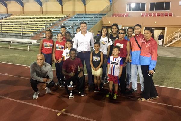 IAAF President Sebastian Coe with local athletes at the national stadium in Oranjestad, Aruba (IAAF)