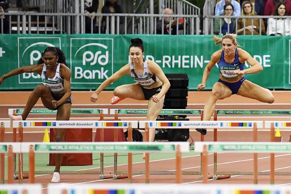 Christina Clemons (left) on her way to winning the 60m hurdles at the World Athletics Indoor Tour meeting in Dusseldorf (Gladys Chai von der Laage)