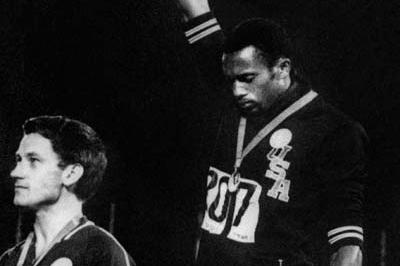 Peter Norman and Tommie Smith on the 200m podium at the 1968 Olympic Games (Getty Images)