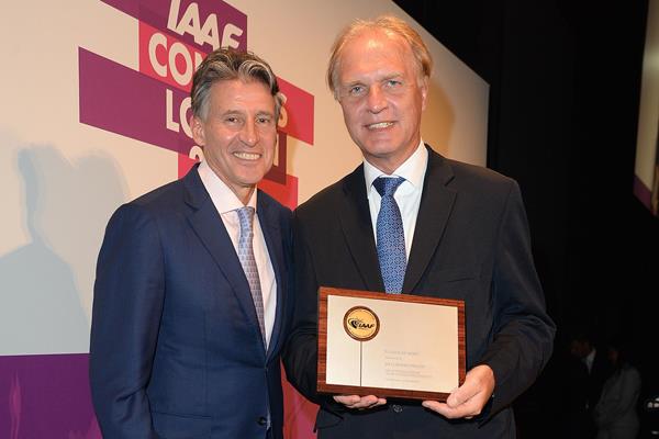 Clemens Prokop of Germany receiving his IAAF Plaque of Merit from IAAF President Sebastian Coe in London (Getty Images)