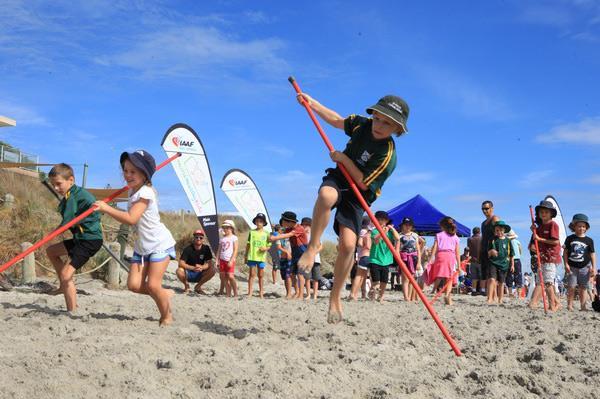Children complete in the pole vault at the IAAF / Nestle Kids' Athletics event in Mt Maunganui, New Zealand (Athletics New Zealand)
