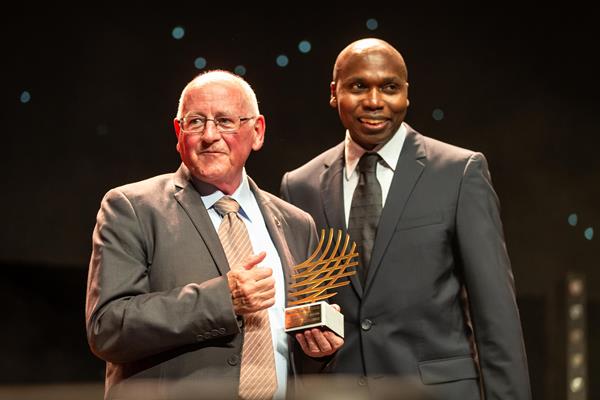 Coaching Achievement Award recipient Brother Colm O'Connell with Wilson Kipketer (Dan Vernon)