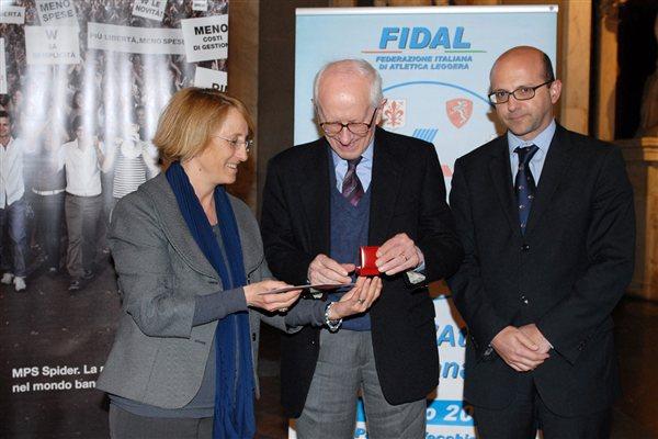 IAAF Council member Anna Riccardi, Roberto L Quercetani and FIDAL Deputy Vice President Alberto Morini in Florence, Salone dei Cinquecento (FIDAL)
