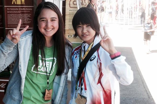 A Japanese athlete visits the We Can! sustainability stand at the 2014 IAAF World Junior Championships in Eugene, Oregon (Shelley Villalobos)