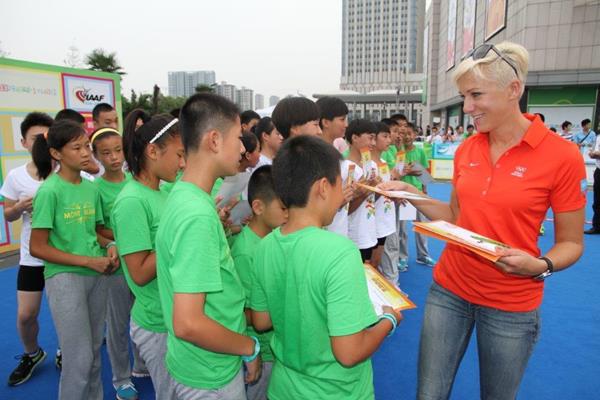 Kajsa Bergqvist at Kids' Athletics event in Nanjing (IAAF )