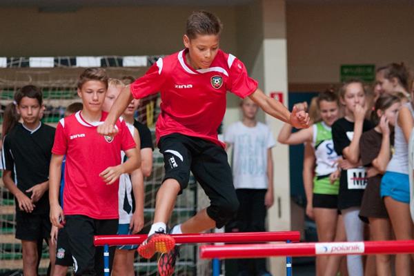 Trying out the hurdles at the athletics camp in Warsaw (Organisers)