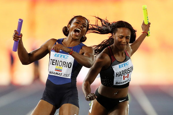 Angela Tenorio of Ecuador and Shaina Harrison of Canada in the 4x100m at the IAAF World Relays (Getty Images)