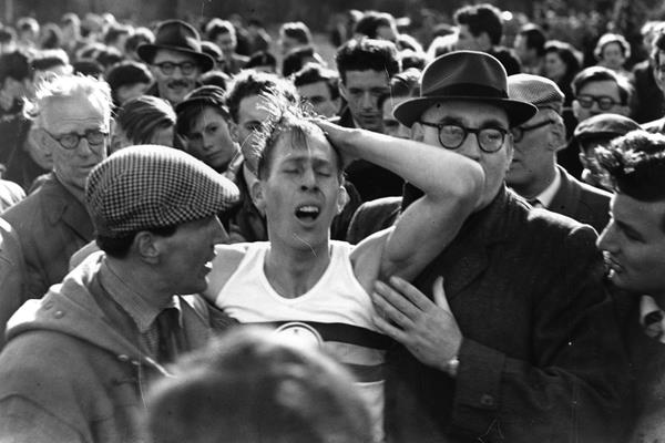 Roger Bannister exhausted after sub-four minute mile ()