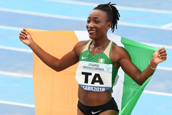 Marie Josee Ta Lou after her double dash victory at the African Championships in Asaba (AFP/Getty Images)