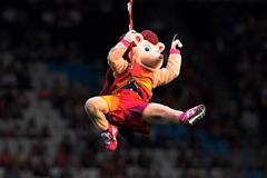 Hero flies into stadium on a zip wire (Getty Images)