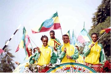 Ethiopian team are welcomed home on top of a bus in Addis Ababa (Abel Tadege)